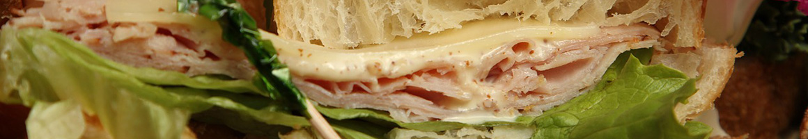 Eating Sandwich at Velocity Five restaurant in Sterling, VA.